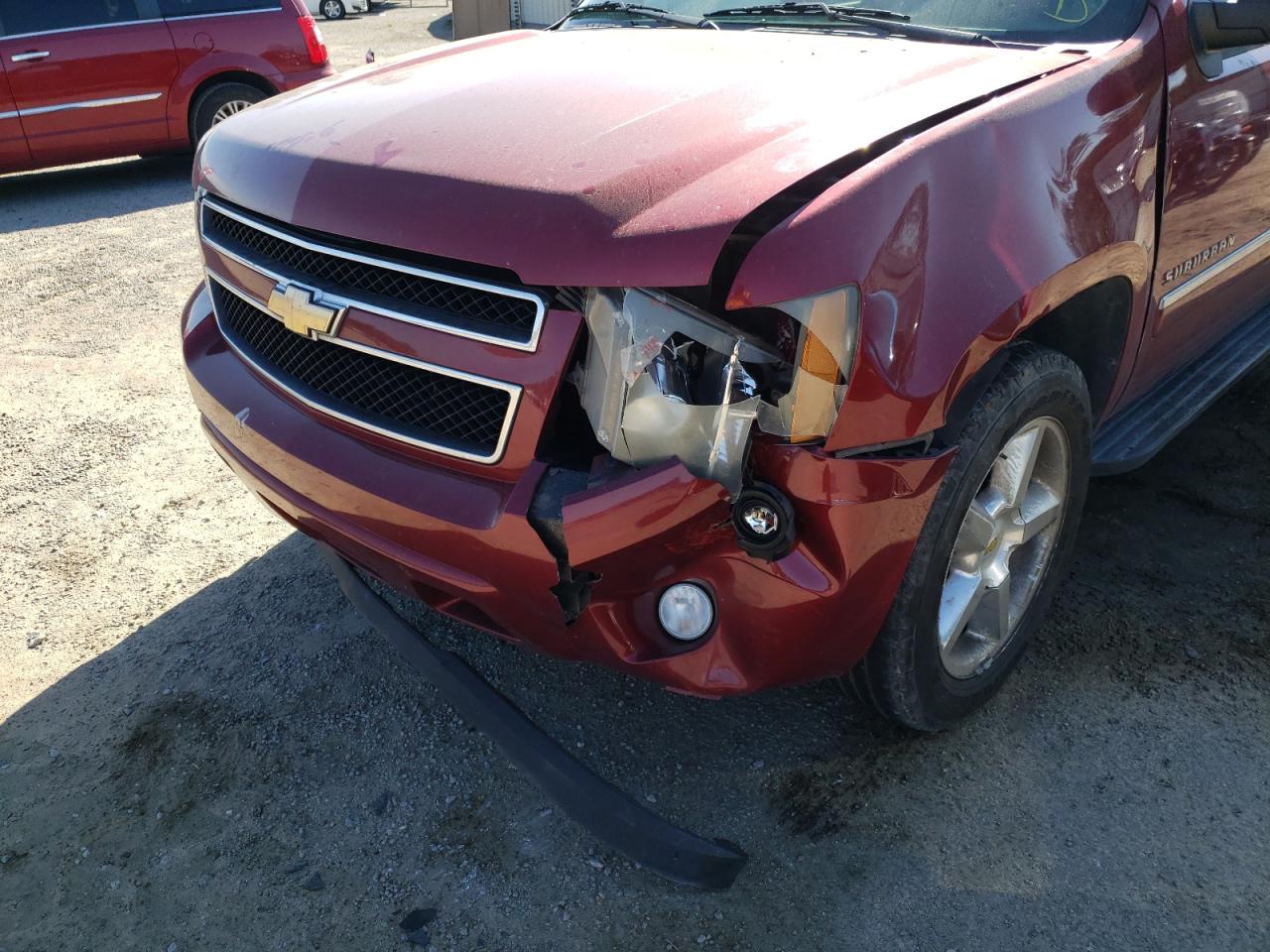 Photo 9 from auction – 2011 CHEVROLET SUBURBAN C with VIN 1GNSCJE04BR296743