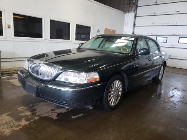 Photo 2 from auction – 2003 LINCOLN CONTINENTA with VIN 1LNHM82W43Y633562