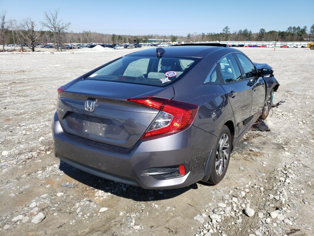 Photo 4 from auction – 2018 HONDA CIVIC EX with VIN 19XFC2F71JE019568