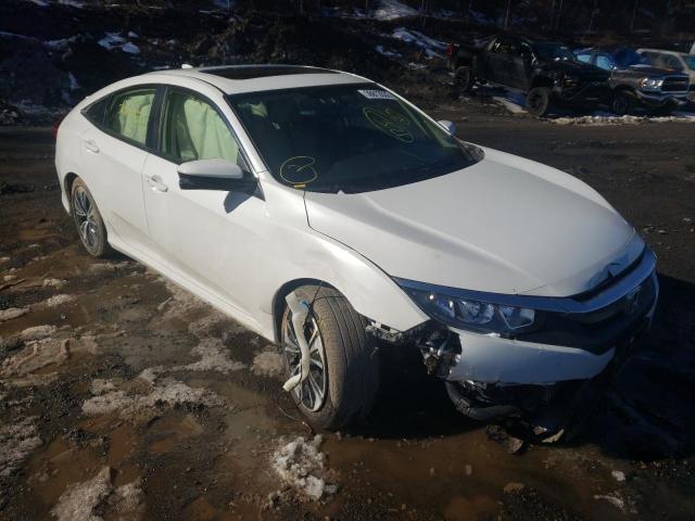 HONDA CIVIC EXL 2018 with VIN JHMFC1F74JX013241 - Photo from auction