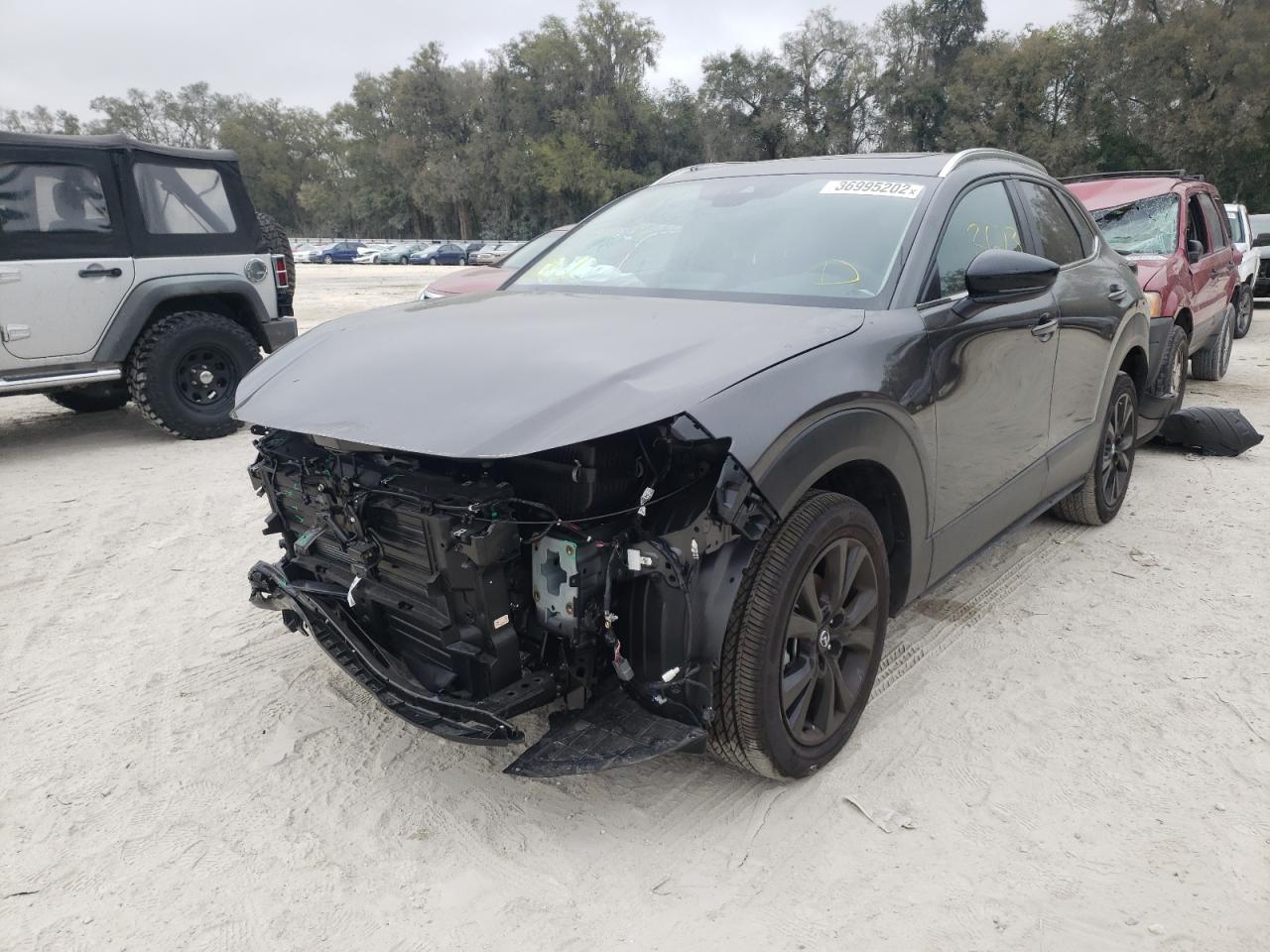 Photo 2 from auction – 2021 MAZDA CX-30 with VIN 3MVDMBAY9MM307478