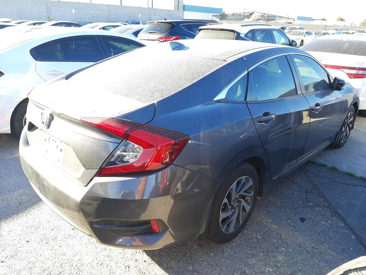 Photo 4 from auction – 2018 HONDA CIVIC EX with VIN 2HGFC2F71JH605435