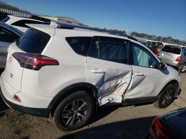 Photo 9 from auction – 2017 TOYOTA RAV4 XLE with VIN 2T3RFREV8HW674399