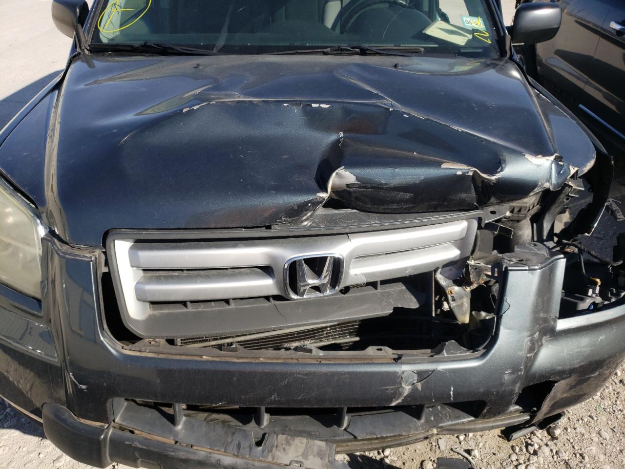 Photo 7 from auction – 2006 HONDA PILOT LX with VIN 5FNYF281X6B036203