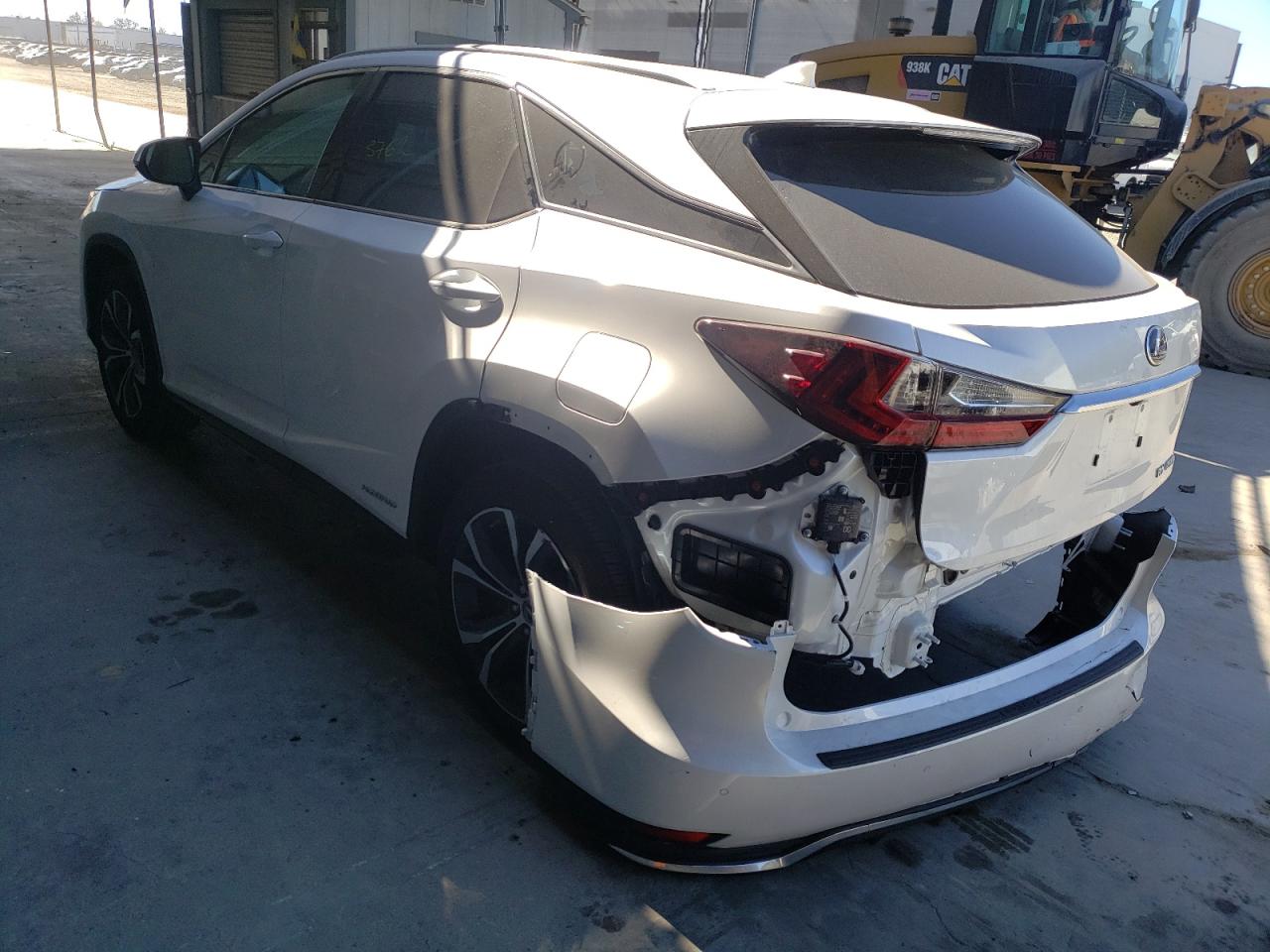 Фото 3 с аукциона – 2021 LEXUS RX 450H с VIN 2T2HGMDA2MC071264