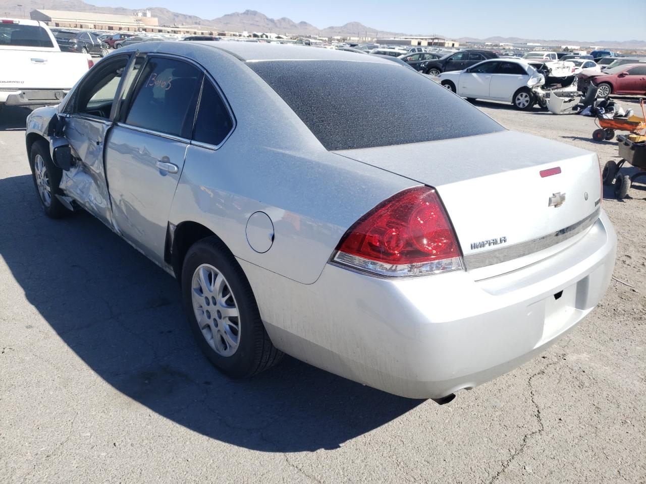 Photo 3 from auction – 2011 CHEVROLET IMPALA POL with VIN 2G1WD5EM9B1301163
