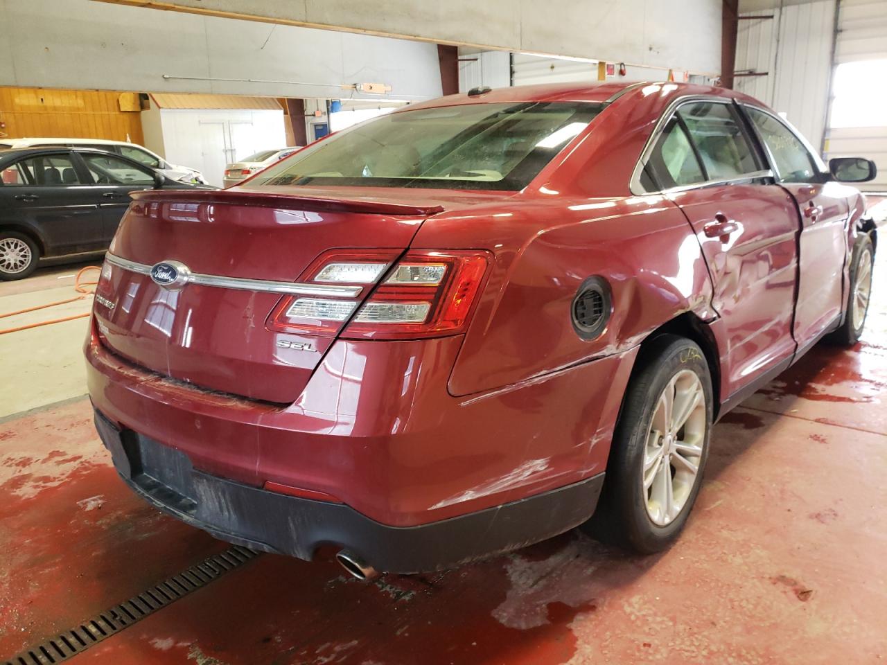 Photo 4 from auction – 2014 FORD TAURUS SEL with VIN 1FAHP2E88EG130895