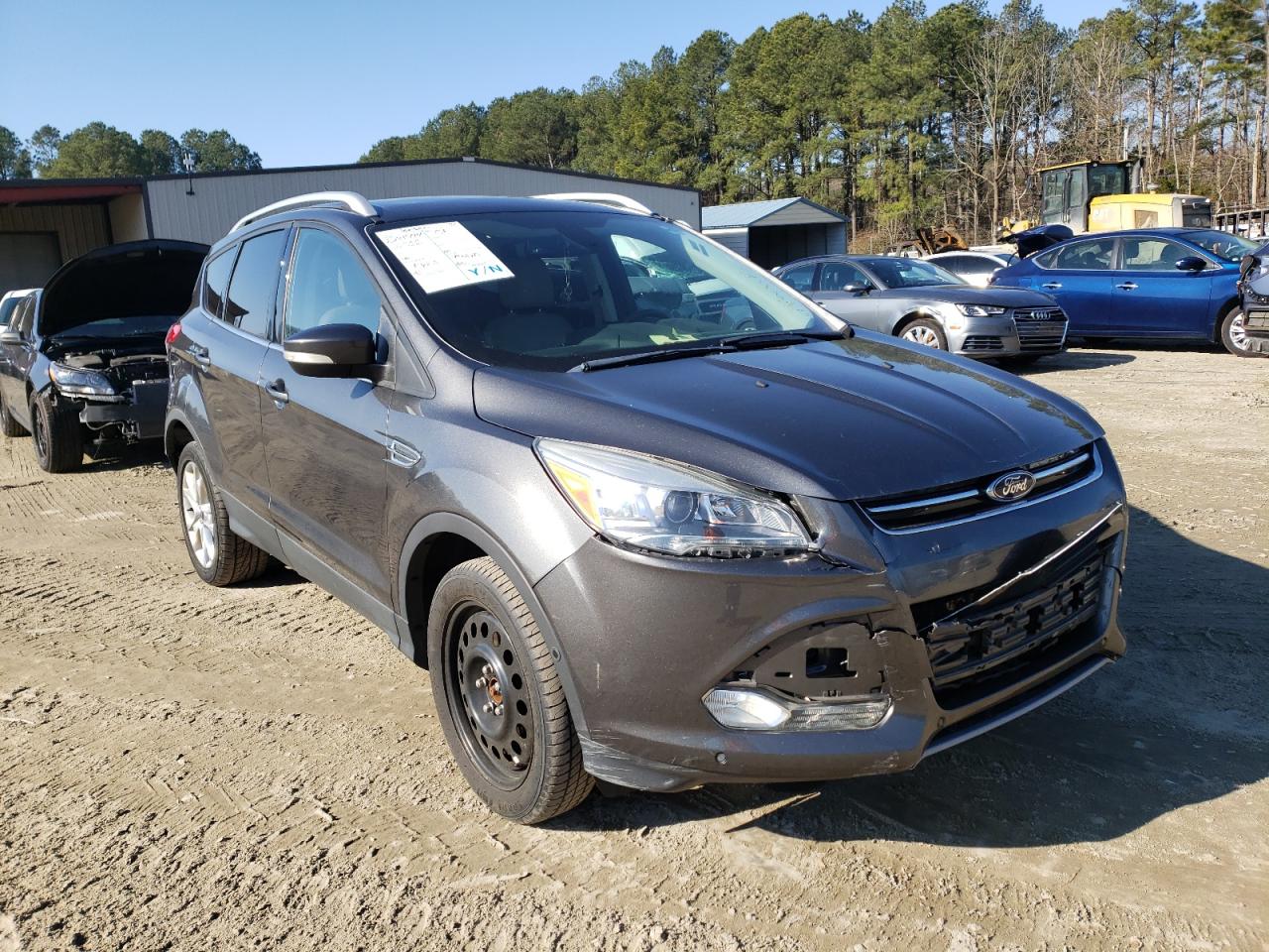 FORD ESCAPE TIT 2015 with VIN 1FMCU9J97FUB44614 - Photo from auction