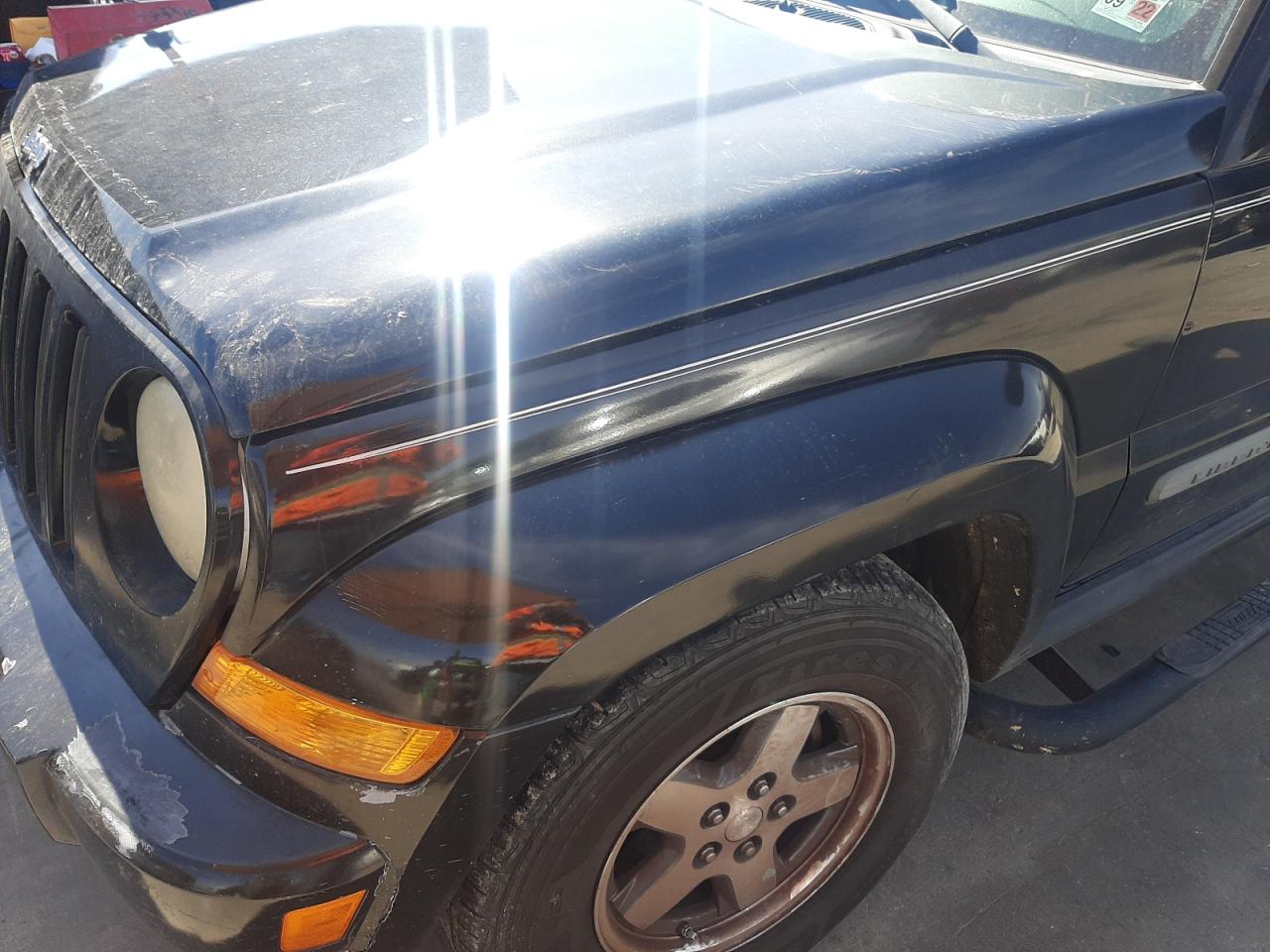 Photo 9 from auction – 2005 JEEP LIBERTY RE with VIN 1J4GK38K85W640259