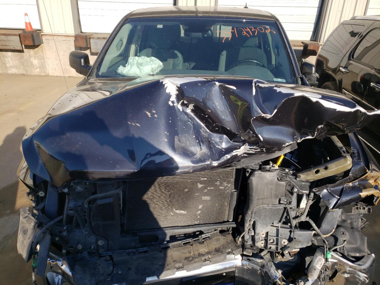 Photo 7 from auction – 2013 RAM 1500 SLT with VIN 1C6RR6GT0DS641019