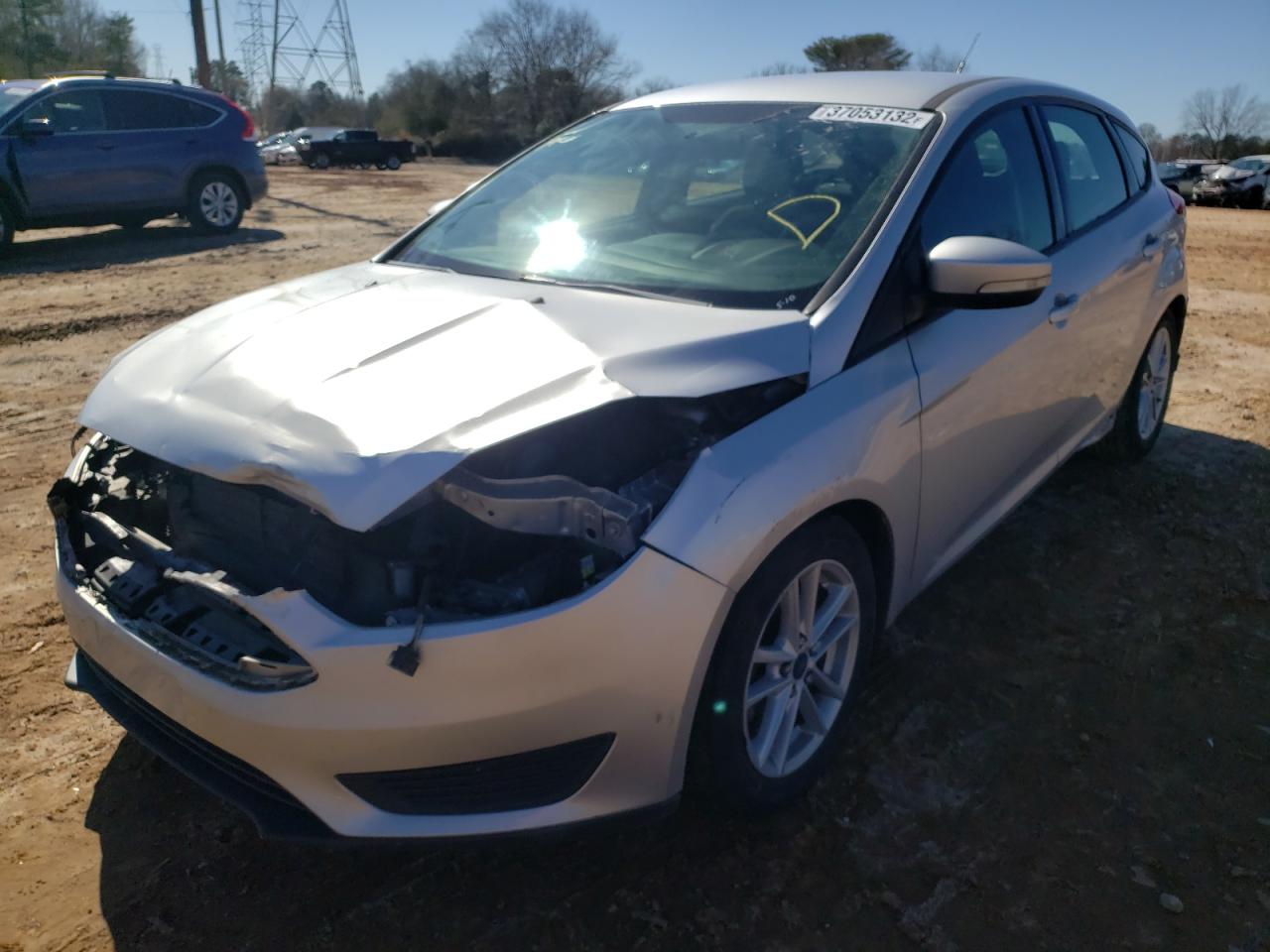 Photo 2 from auction – 2015 FORD FOCUS SE with VIN 1FADP3K22FL242248