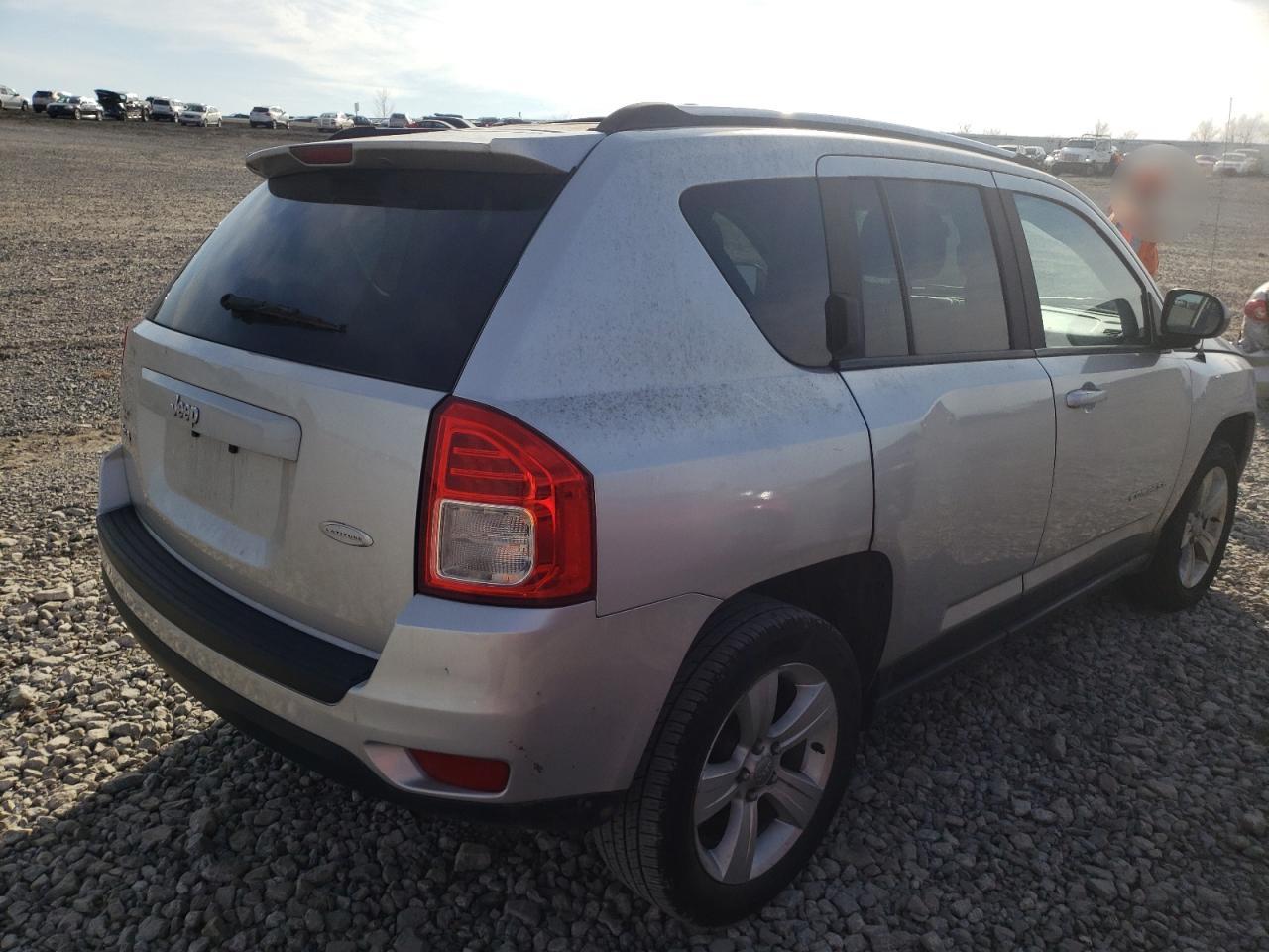 Photo 4 from auction – 2013 JEEP COMPASS LA with VIN 1C4NJDEB9DD233801