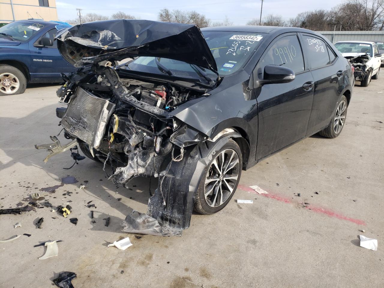 Photo 2 from auction – 2017 TOYOTA COROLLA L with VIN 2T1BURHEXHC827328