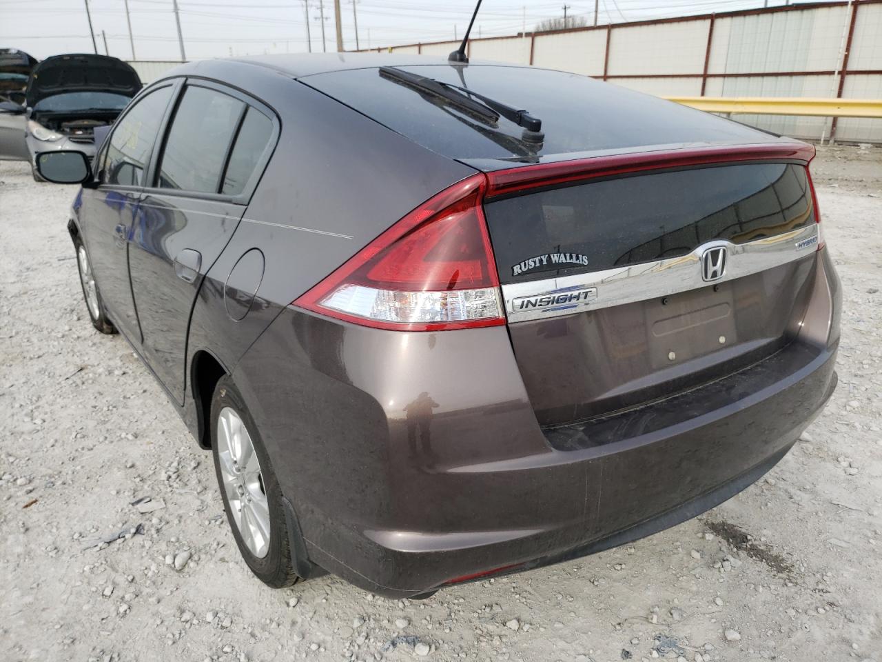 Photo 3 from auction – 2014 HONDA INSIGHT EX with VIN JHMZE2H79ES001695
