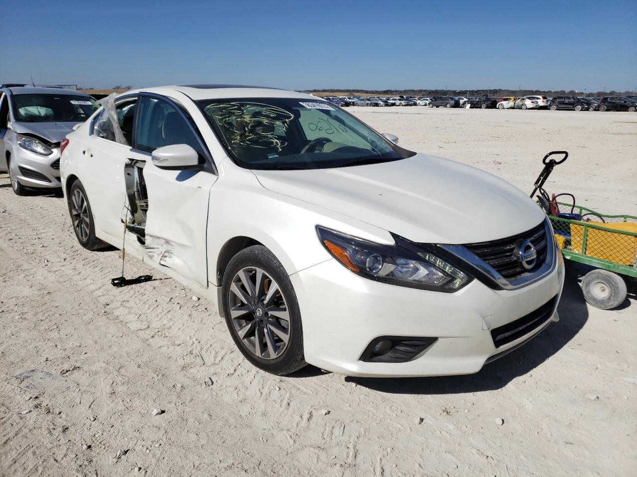 NISSAN ALTIMA 2.5 2016 with VIN 1N4AL3AP7GC294357 - Photo from auction