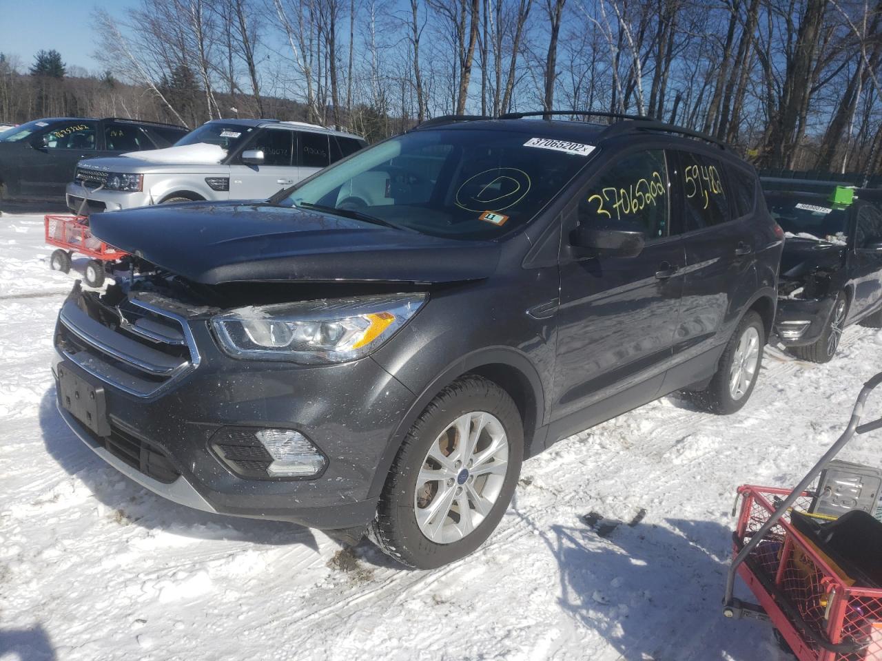 Photo 2 from auction – 2017 FORD ESCAPE SE with VIN 1FMCU0GD9HUA07877