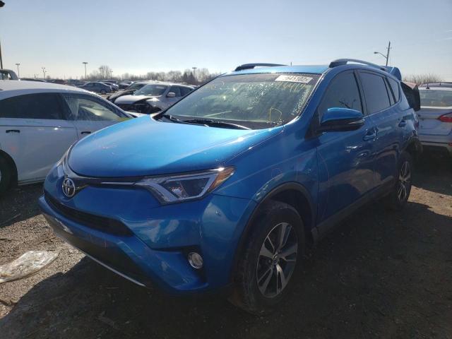 Photo 2 from auction – 2016 TOYOTA RAV4 XLE with VIN JTMWFREV9GJ076418