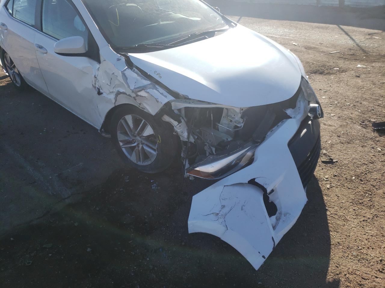 Photo 9 from auction – 2014 TOYOTA COROLLA EC with VIN 5YFBPRHE5EP030603