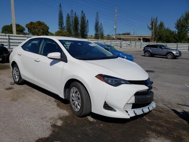TOYOTA COROLLA L 2019 with VIN 5YFBURHE9KP904858 - Photo from auction