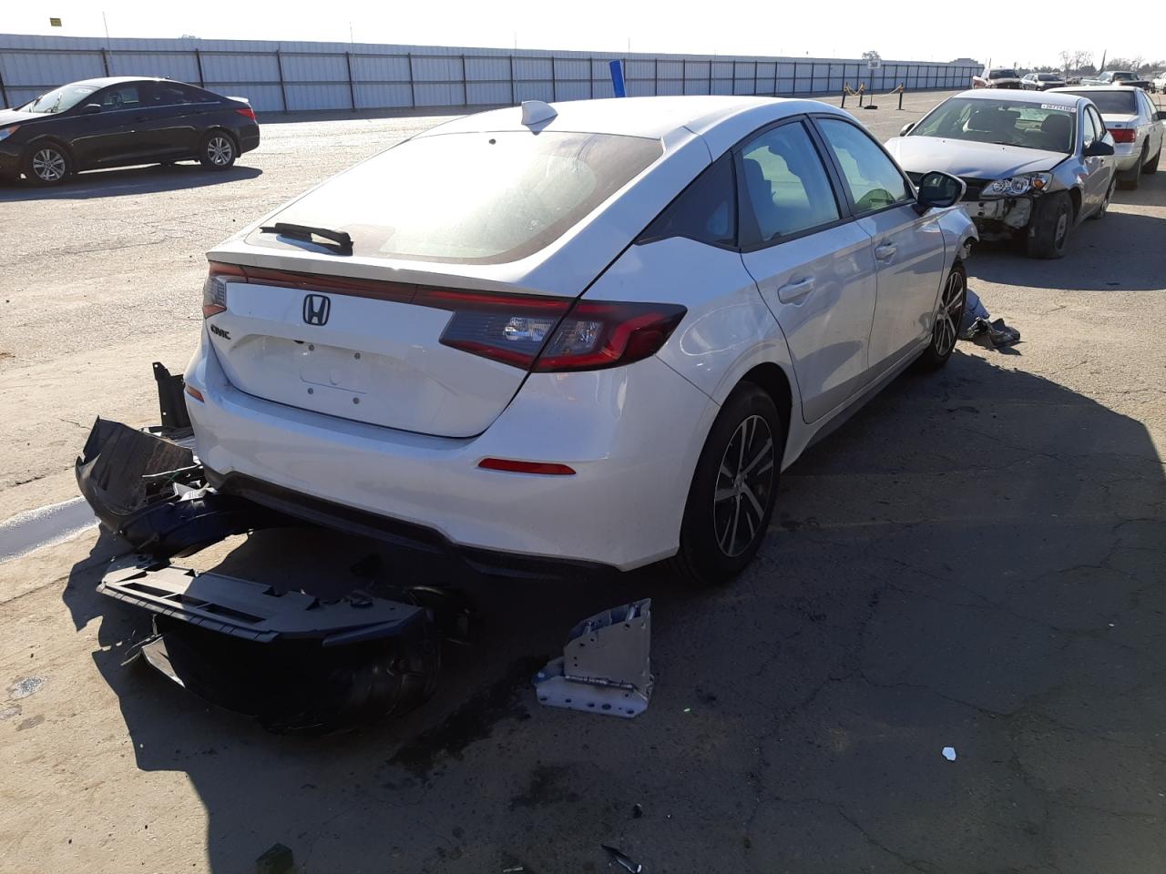 Photo 4 from auction – 2022 HONDA CIVIC LX with VIN 19XFL2H57NE000329