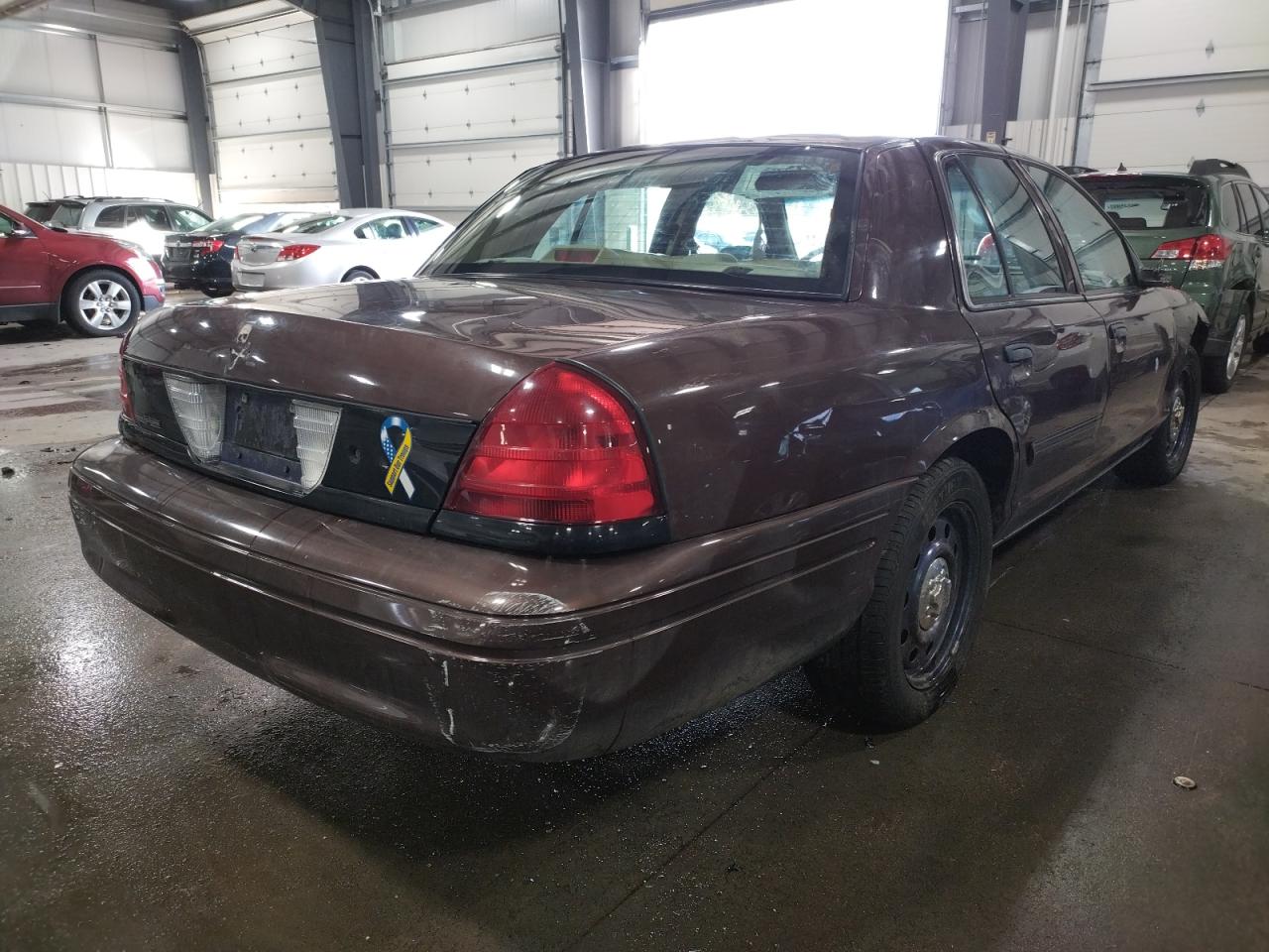 Photo 4 from auction – 2010 FORD CROWN VICT with VIN 2FABP7BV7AX128296