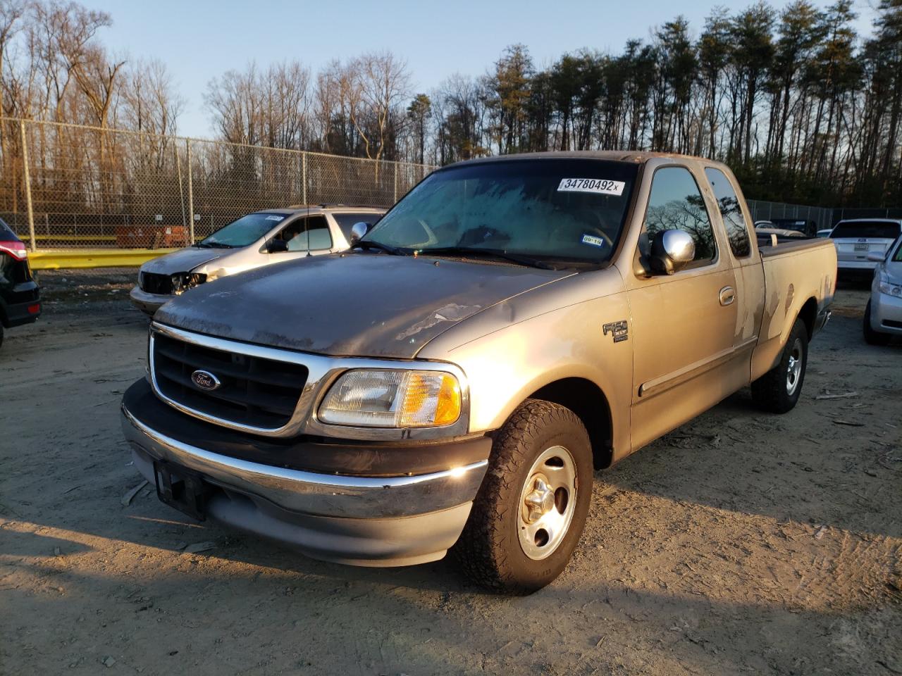 Photo 2 from auction – 2001 FORD F150 with VIN 1FTRX17L81NA32515