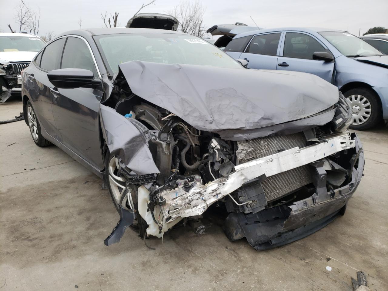HONDA CIVIC LX 2018 with VIN 19XFC2F54JE018199 - Photo from auction