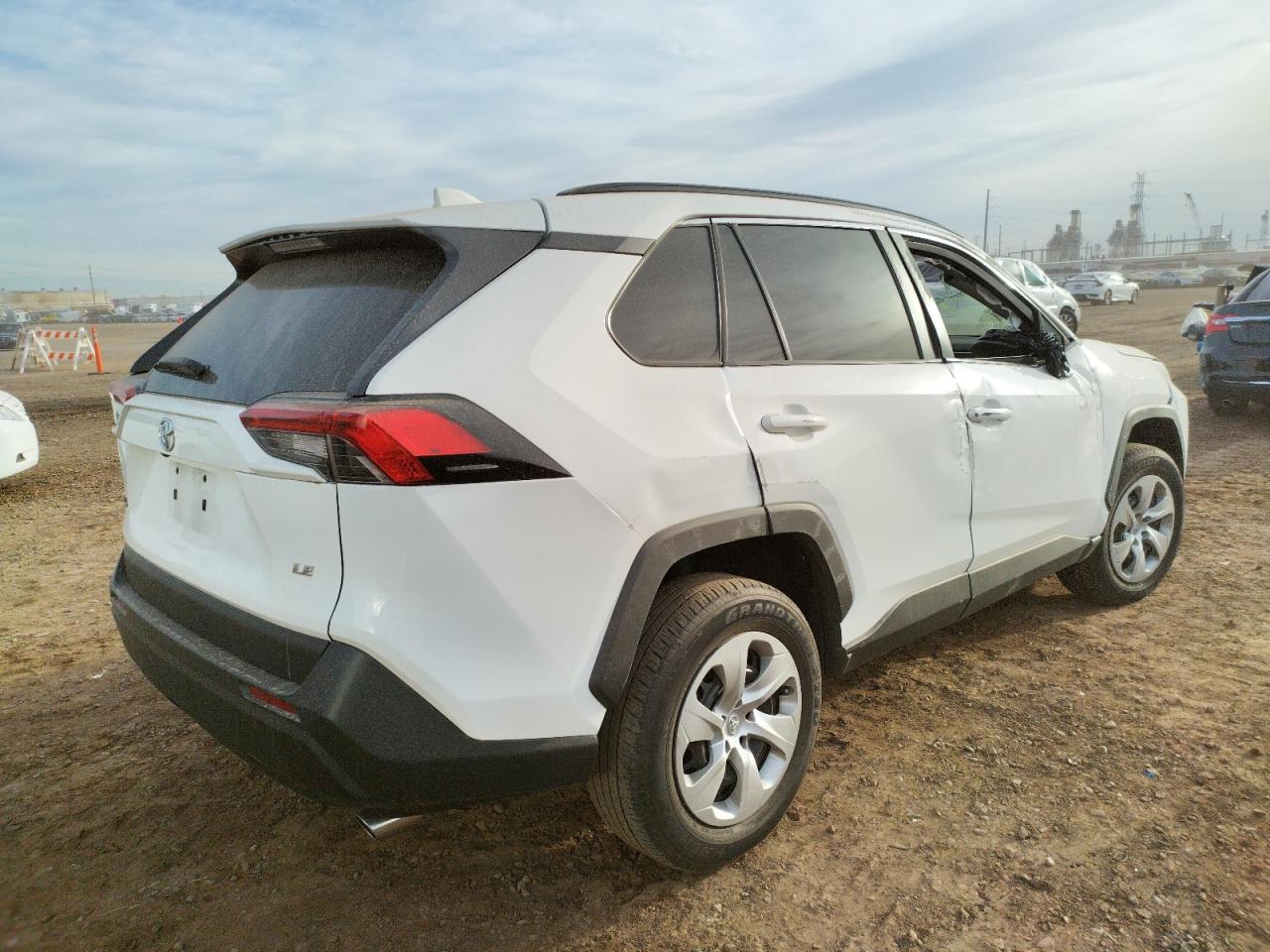 Photo 4 from auction – 2021 TOYOTA RAV4 LE with VIN 2T3H1RFV4MW106590