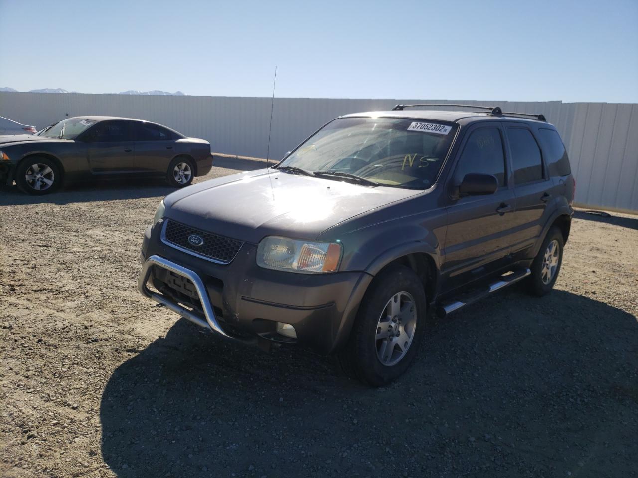 Photo 2 from auction – 2004 FORD ESCAPE LIM with VIN 1FMCU04164KA20229