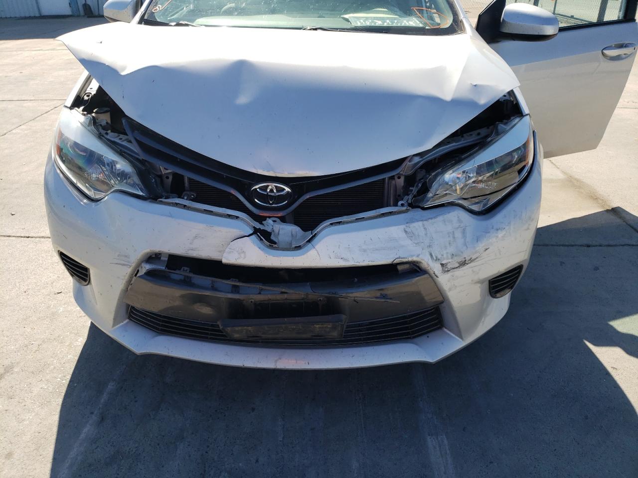Photo 7 from auction – 2015 TOYOTA COROLLA L with VIN 2T1BURHEXFC256422
