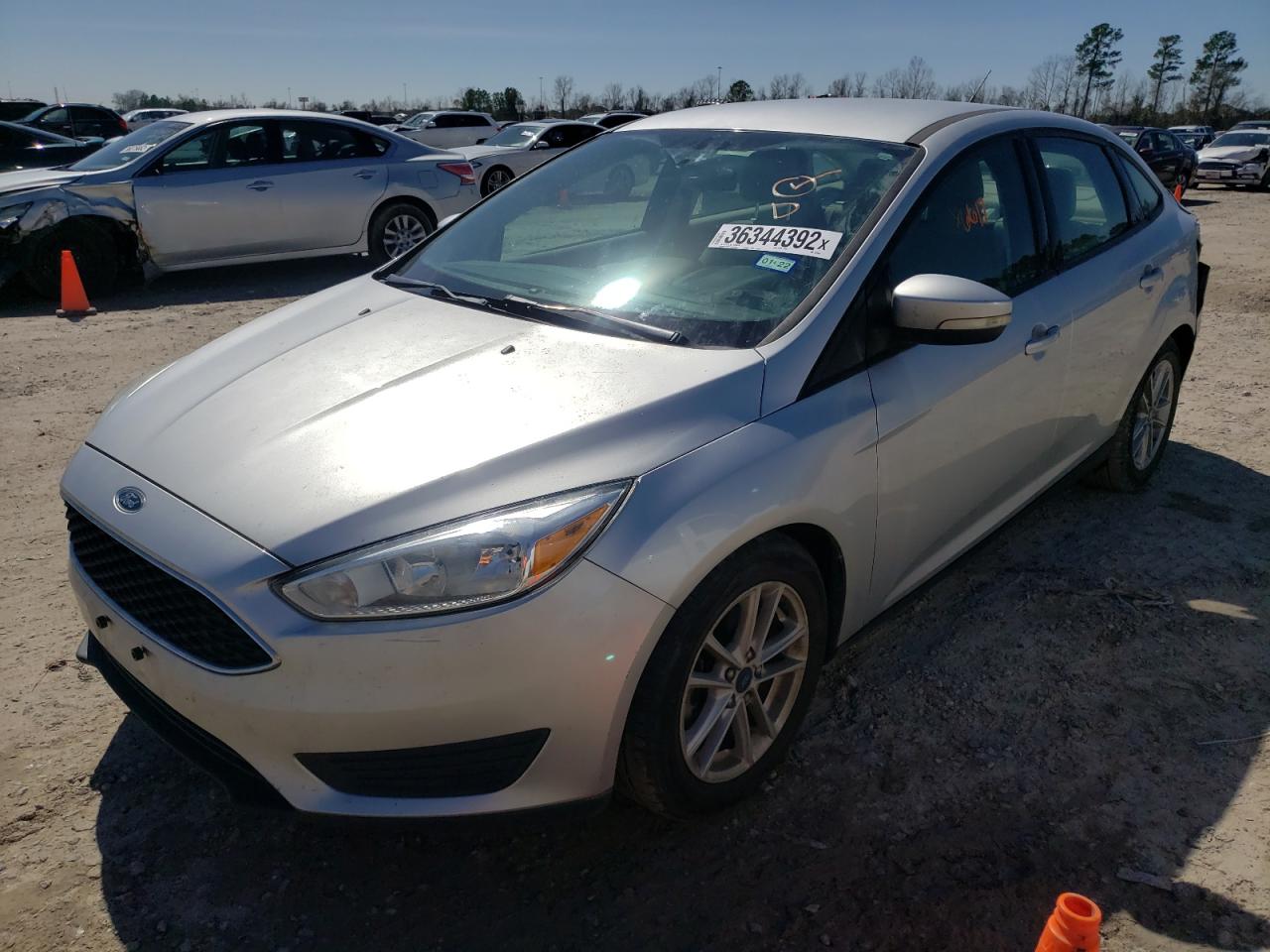 Photo 2 from auction – 2017 FORD FOCUS SE with VIN 1FADP3F22HL247639