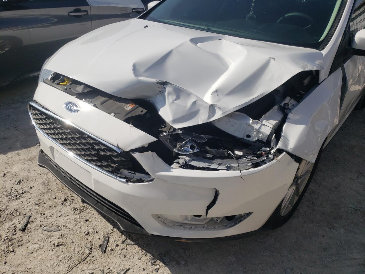 Photo 9 from auction – 2016 FORD FOCUS SE with VIN 1FADP3F2XGL220610