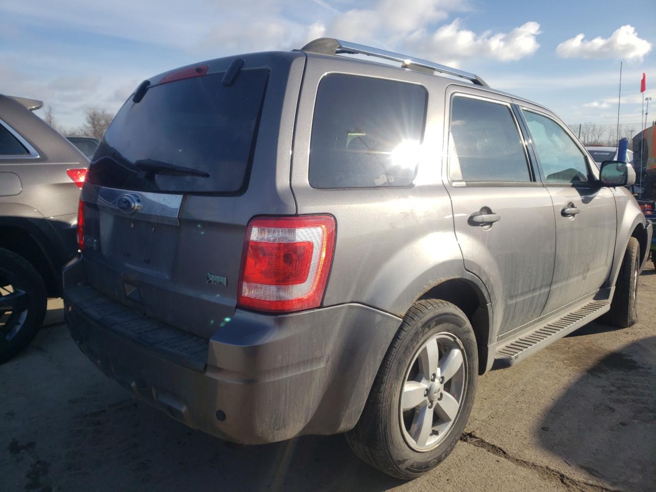 Photo 4 from auction – 2010 FORD ESCAPE LIM with VIN 1FMCU9EG6AKD08514