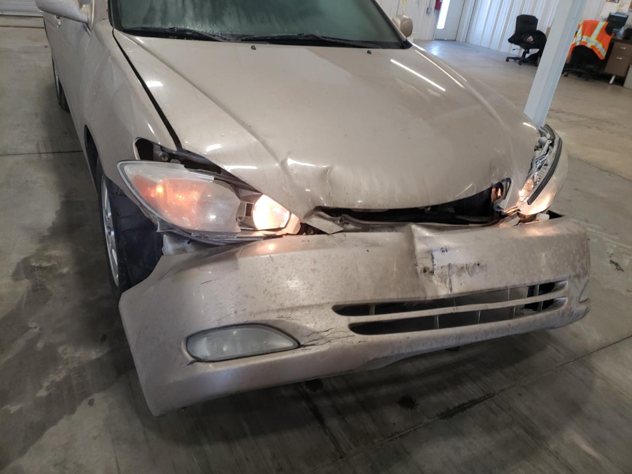 Photo 9 from auction – 2003 TOYOTA CAMRY LE with VIN 4T1BE32K83U718852