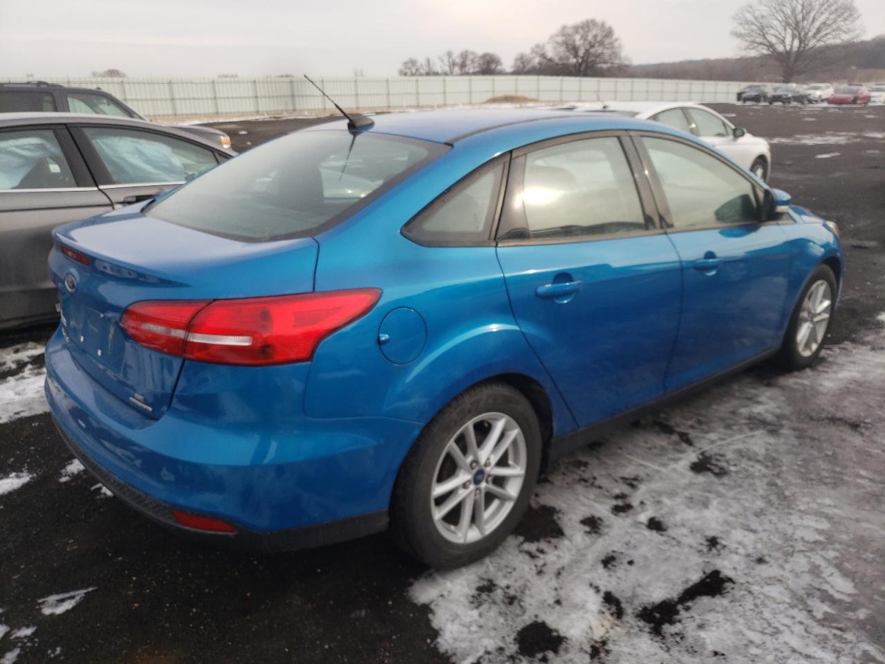 Photo 4 from auction – 2015 FORD FOCUS SE with VIN 1FADP3F27FL256026
