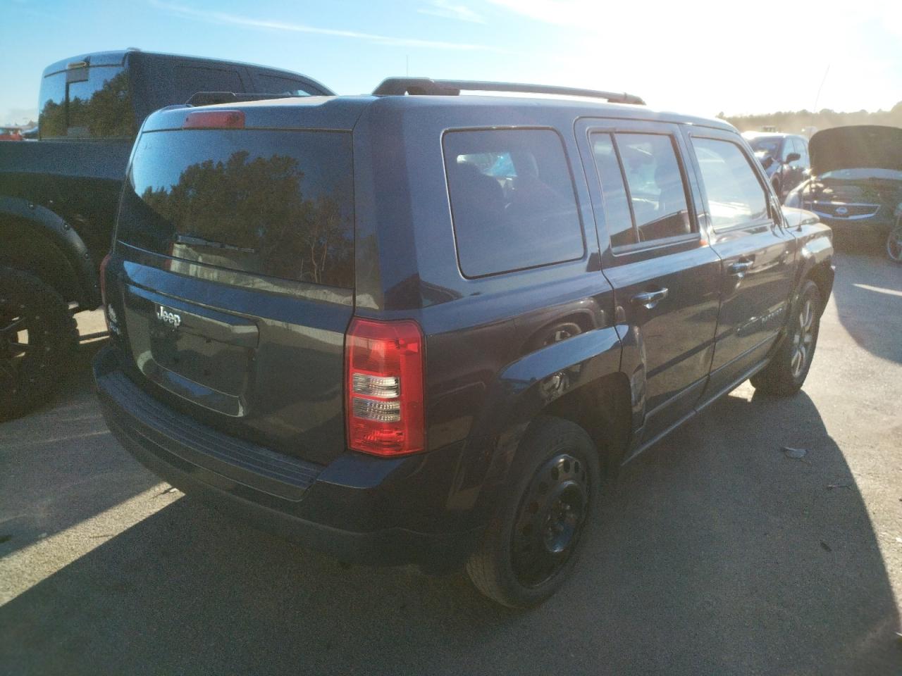 Photo 4 from auction – 2014 JEEP PATRIOT SP with VIN 1C4NJRBB4ED778758