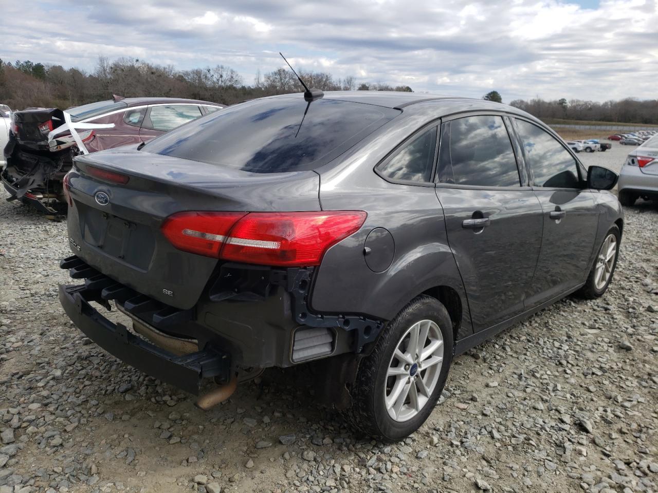 Photo 4 from auction – 2018 FORD FOCUS SE with VIN 1FADP3F25JL280348