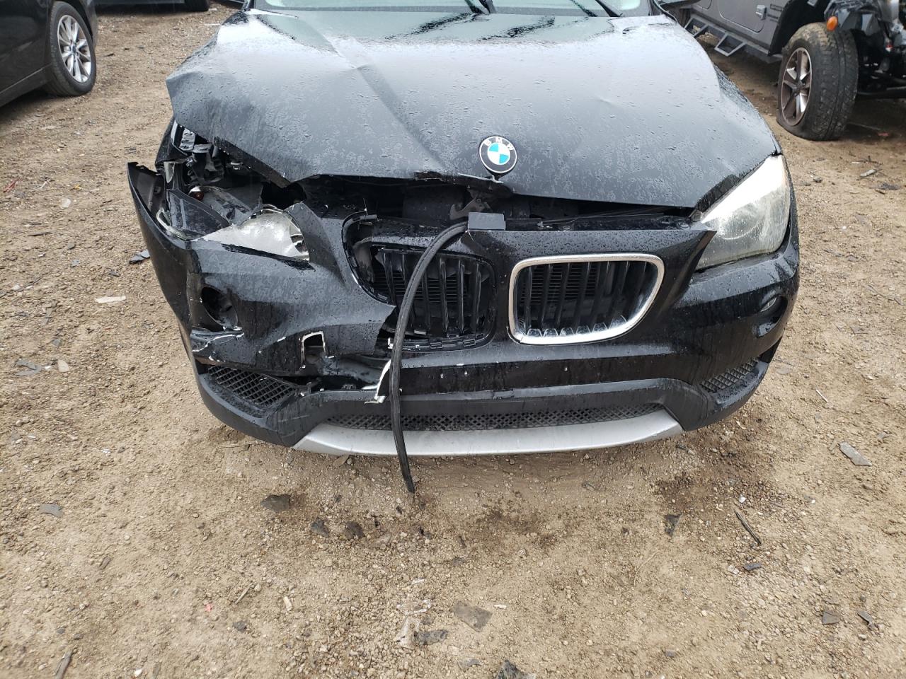 Photo 9 from auction – 2013 BMW X1 SDRIVE2 with VIN WBAVM1C52DVW41275