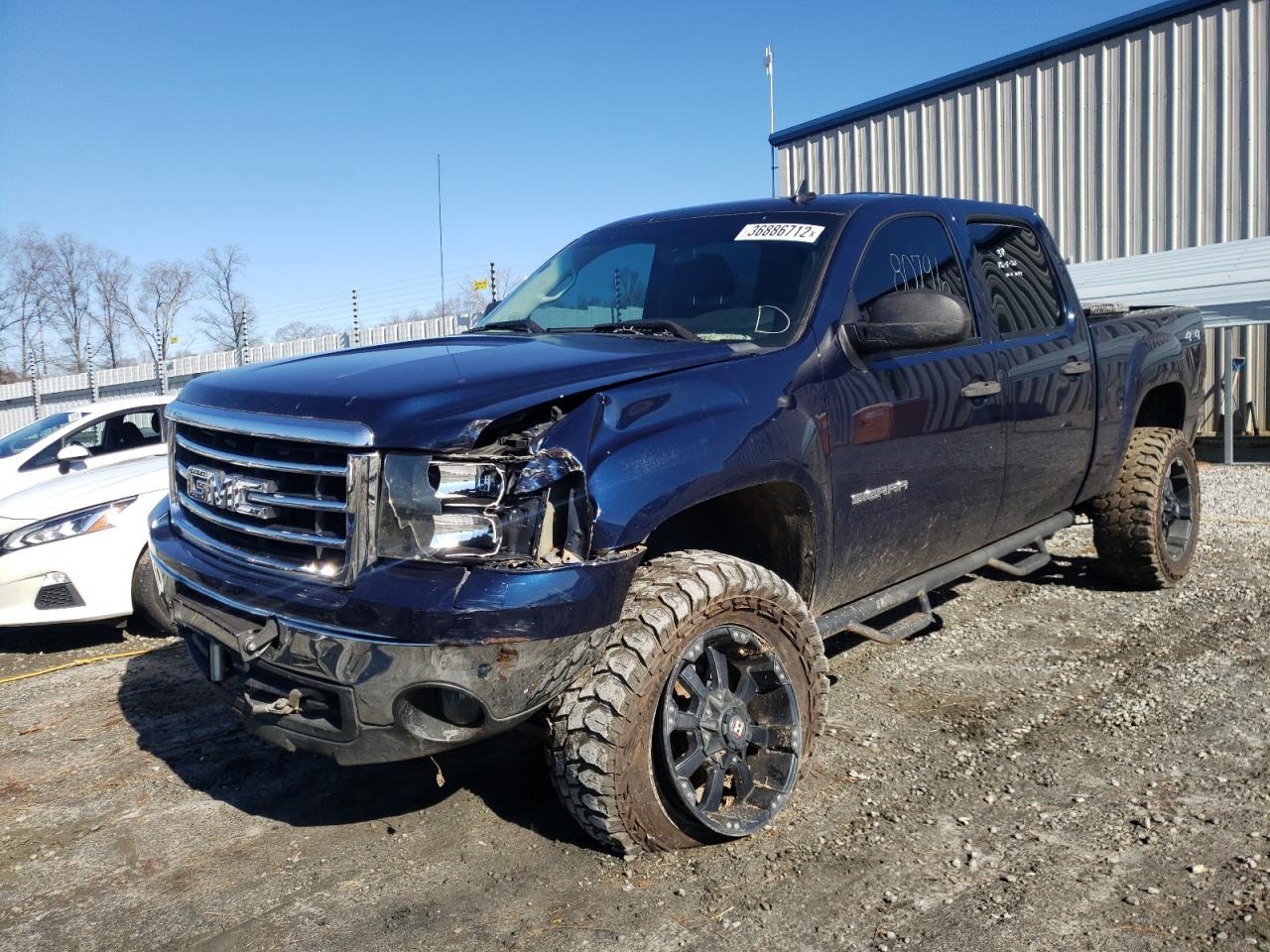 Photo 2 from auction – 2012 GMC SIERRA K15 with VIN 3GTP2VE79CG302639
