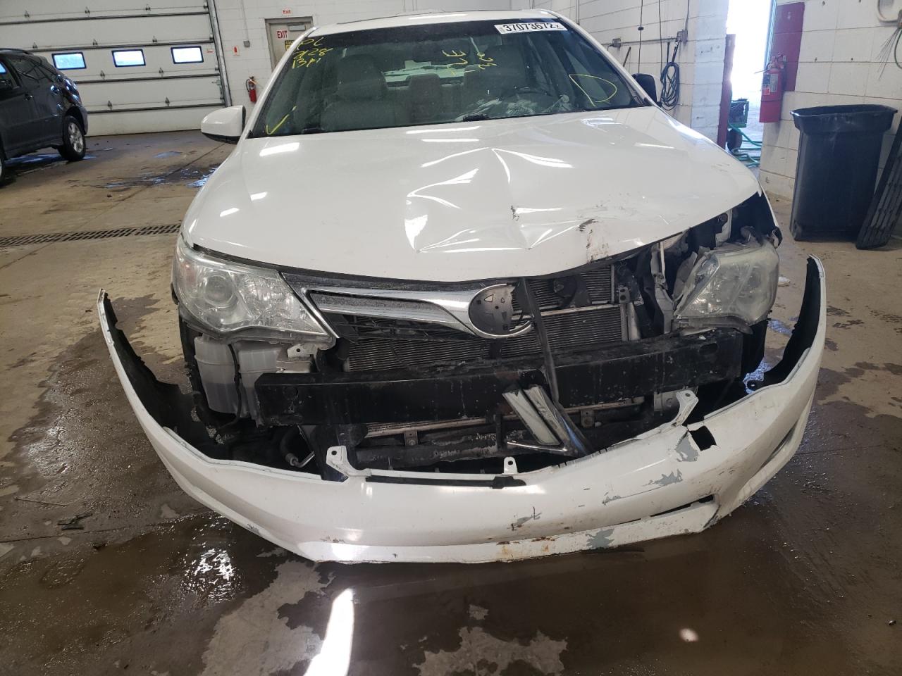 Photo 9 from auction – 2012 TOYOTA CAMRY HYBR with VIN 4T1BD1FK2CU057630