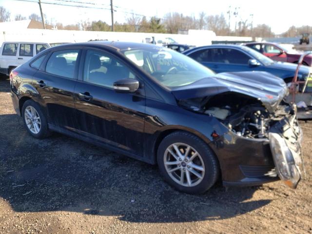 FORD FOCUS SE 2016 with VIN 1FADP3F21GL317856 - Photo from auction