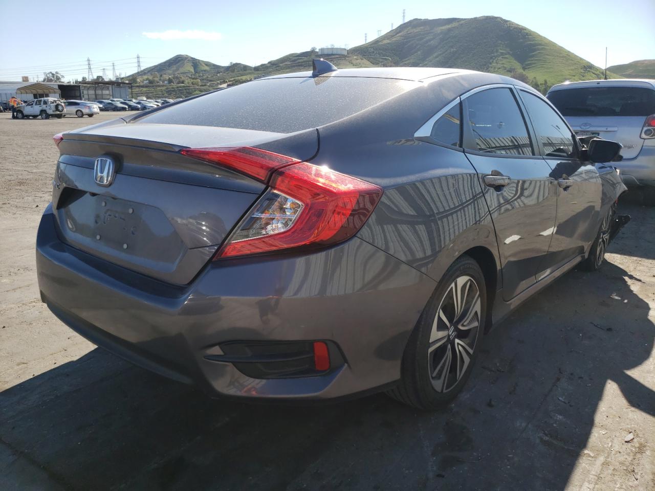 Photo 4 from auction – 2016 HONDA CIVIC EX with VIN 2HGFC1F35GH652595