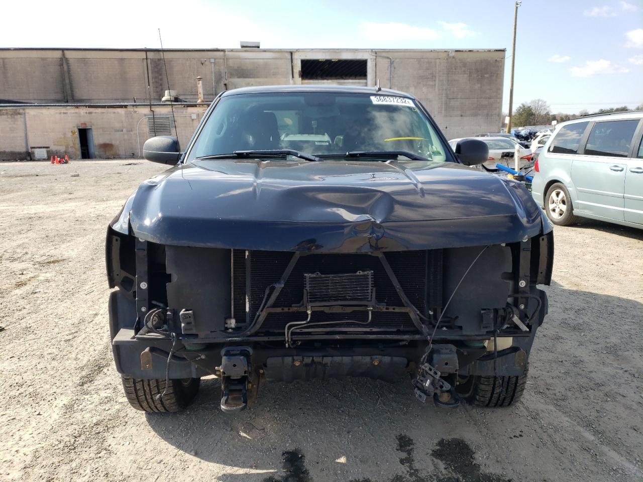 Photo 9 from auction – 2011 CHEVROLET SILVERADO with VIN 1GCRKSE31BZ266769
