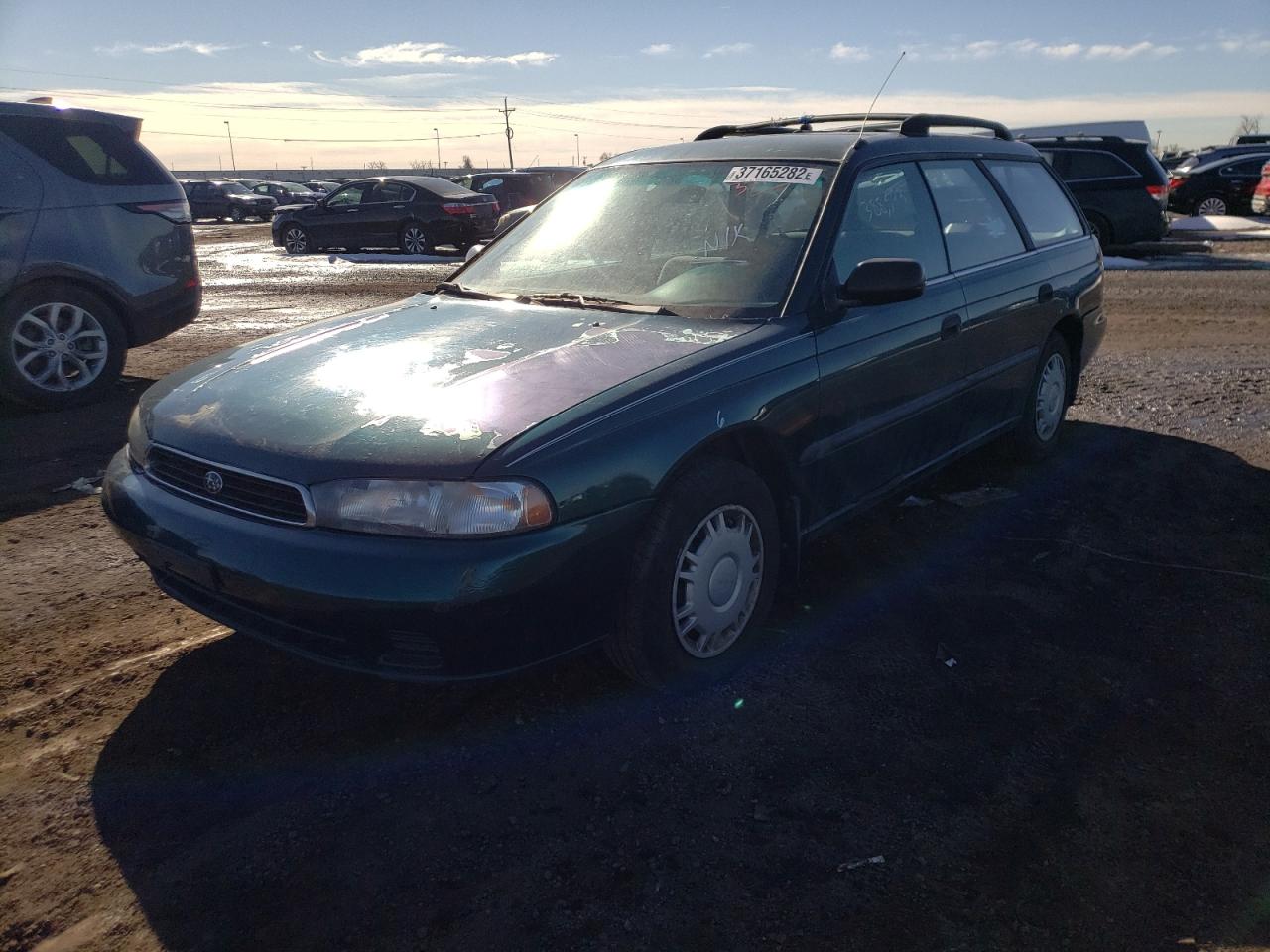 Photo 12 from auction – 1997 SUBARU LEGACY L with VIN 4S3BK4356V6317545