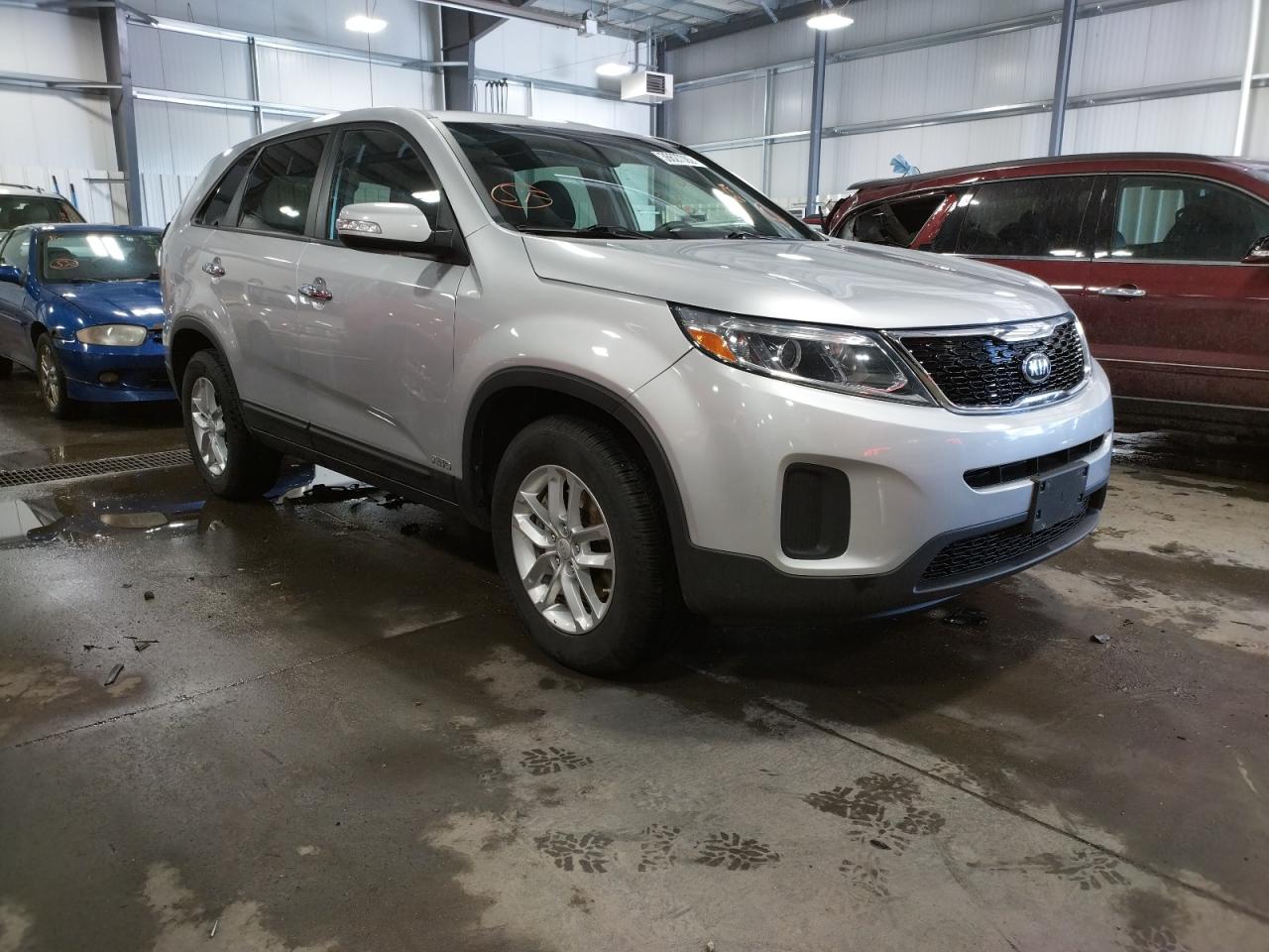 KIA SORENTO LX 2015 with VIN 5XYKTCA69FG610969 - Photo from auction