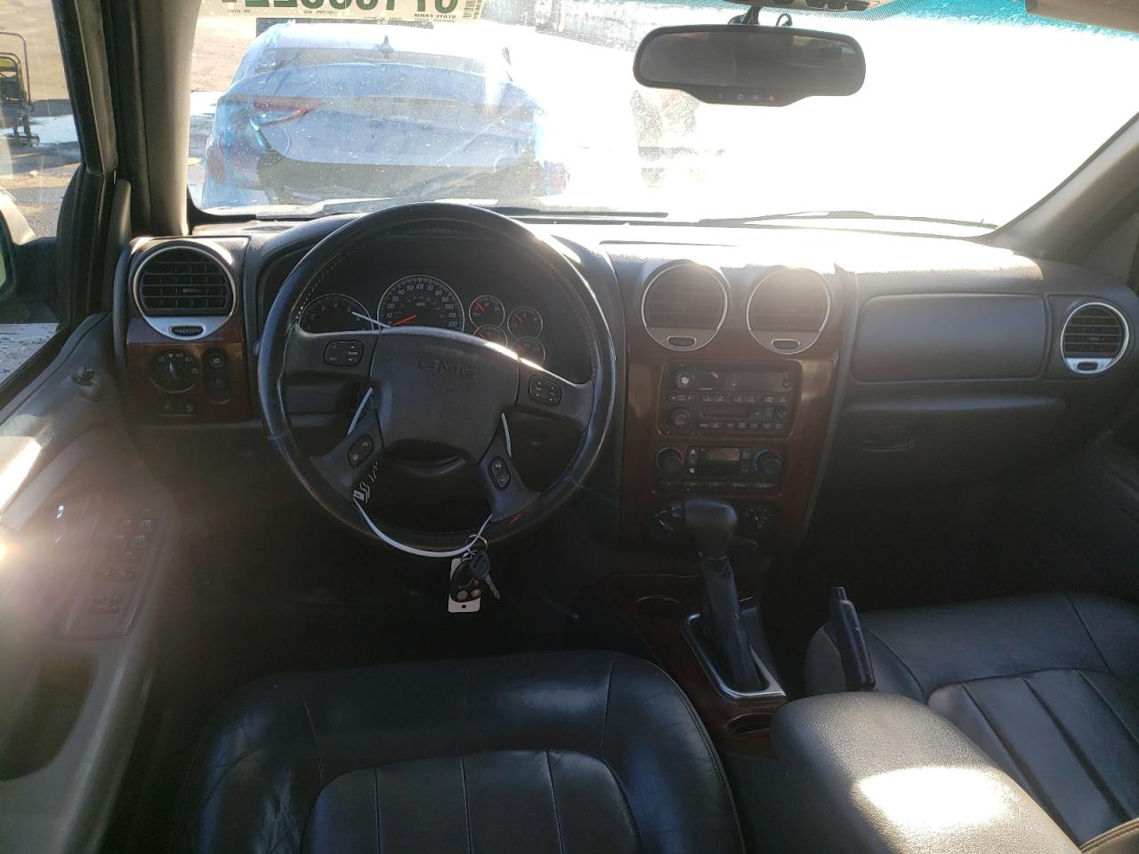 Photo 9 from auction – 2004 GMC ENVOY with VIN 1GKDT13S142411451