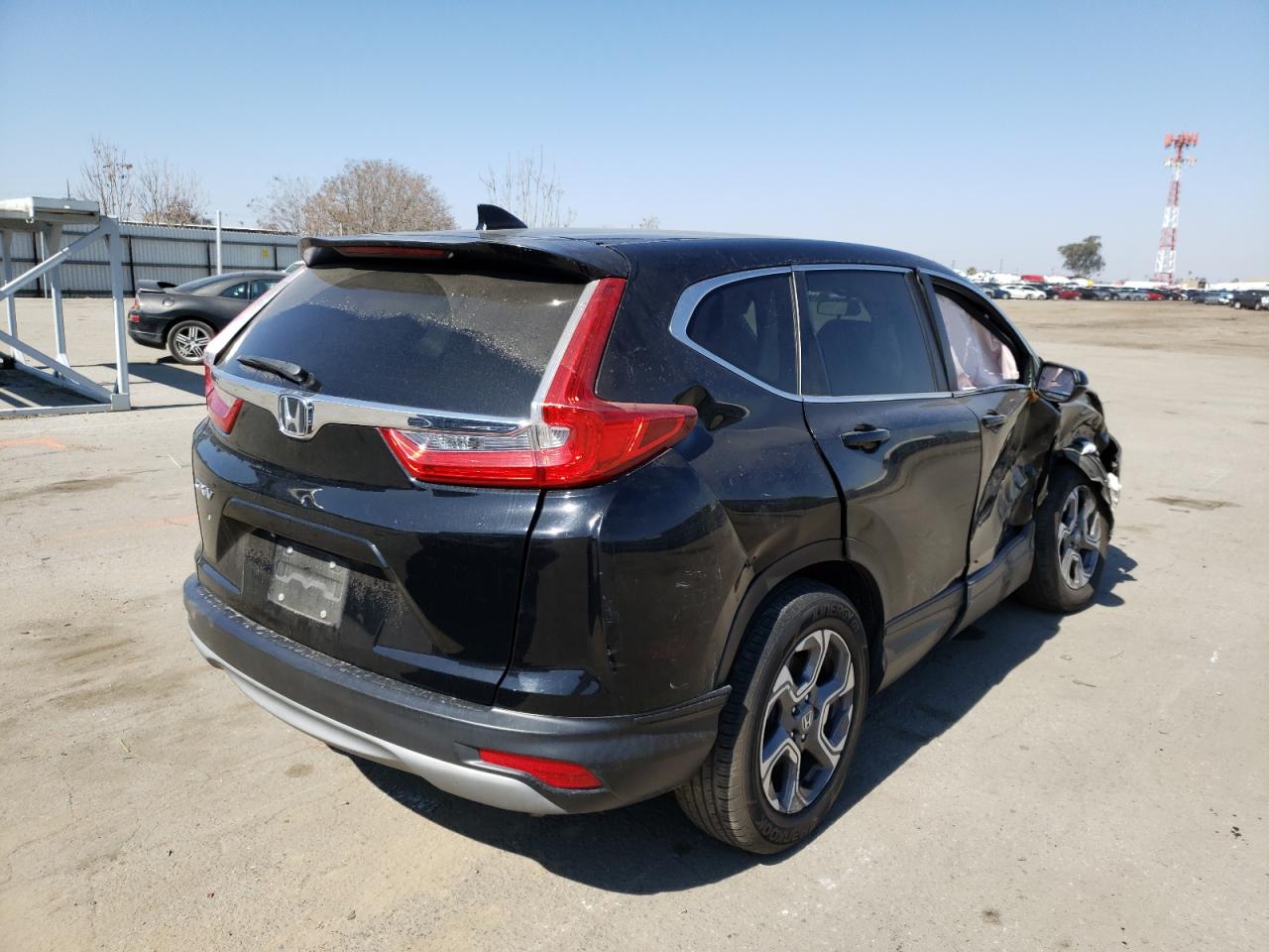 Photo 4 from auction – 2017 HONDA CR-V EX with VIN 7FARW1H55HE008267