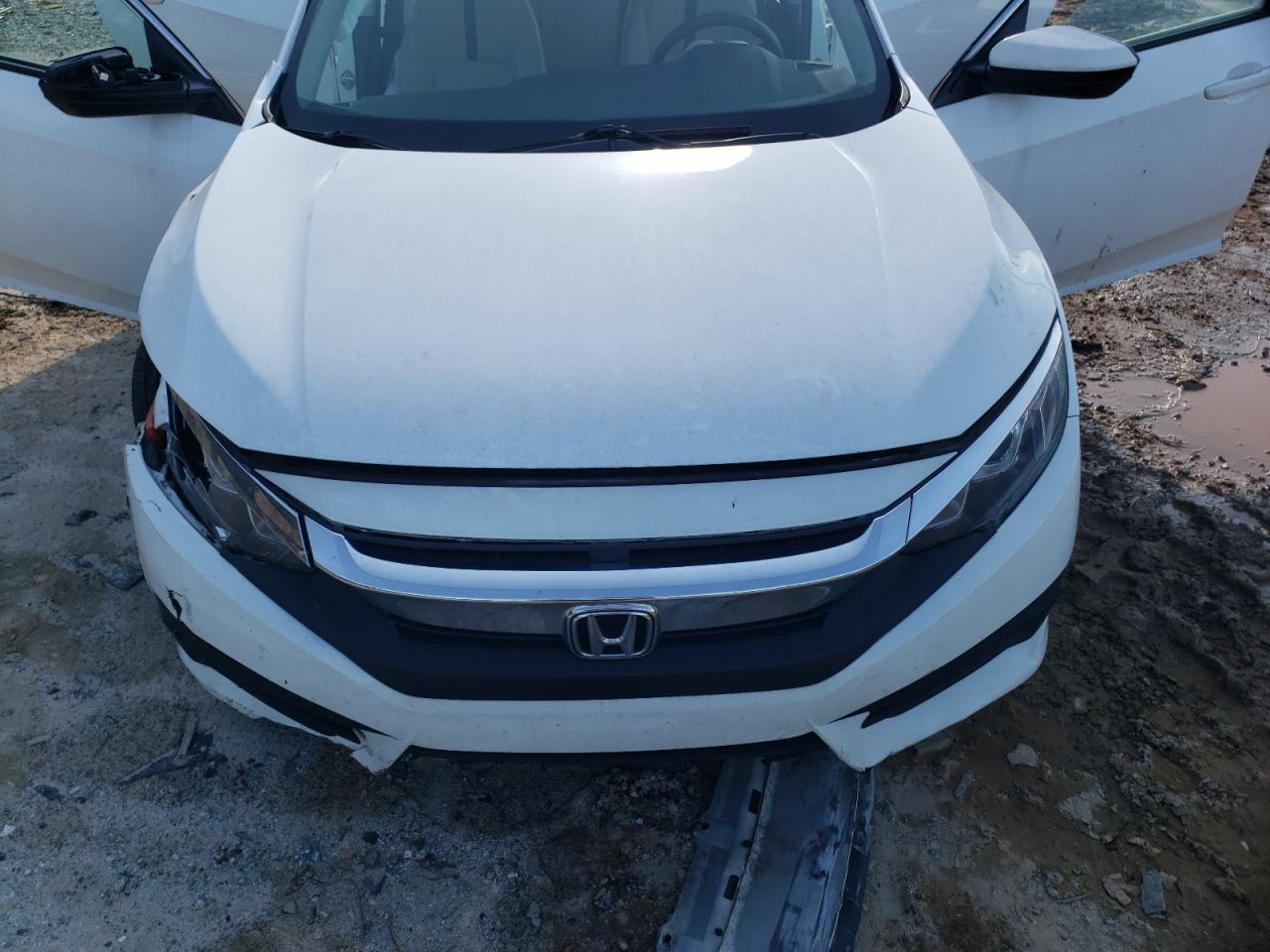 Photo 7 from auction – 2017 HONDA CIVIC LX with VIN 19XFC2F54HE036888