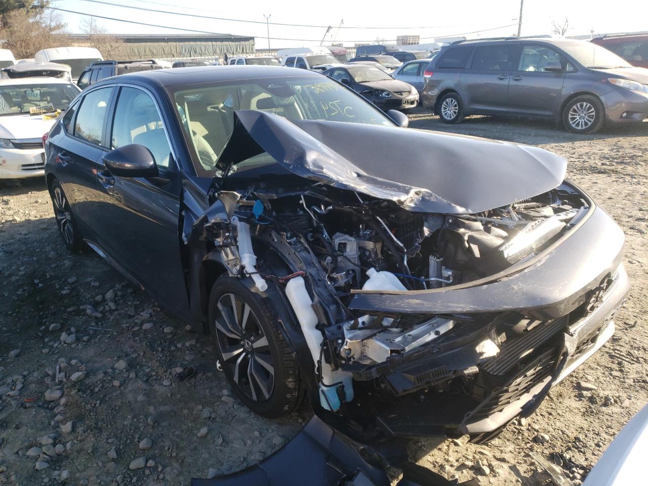 Photo 1 from auction – 2022 HONDA CIVIC EX with VIN JHMFE1F78NX007183
