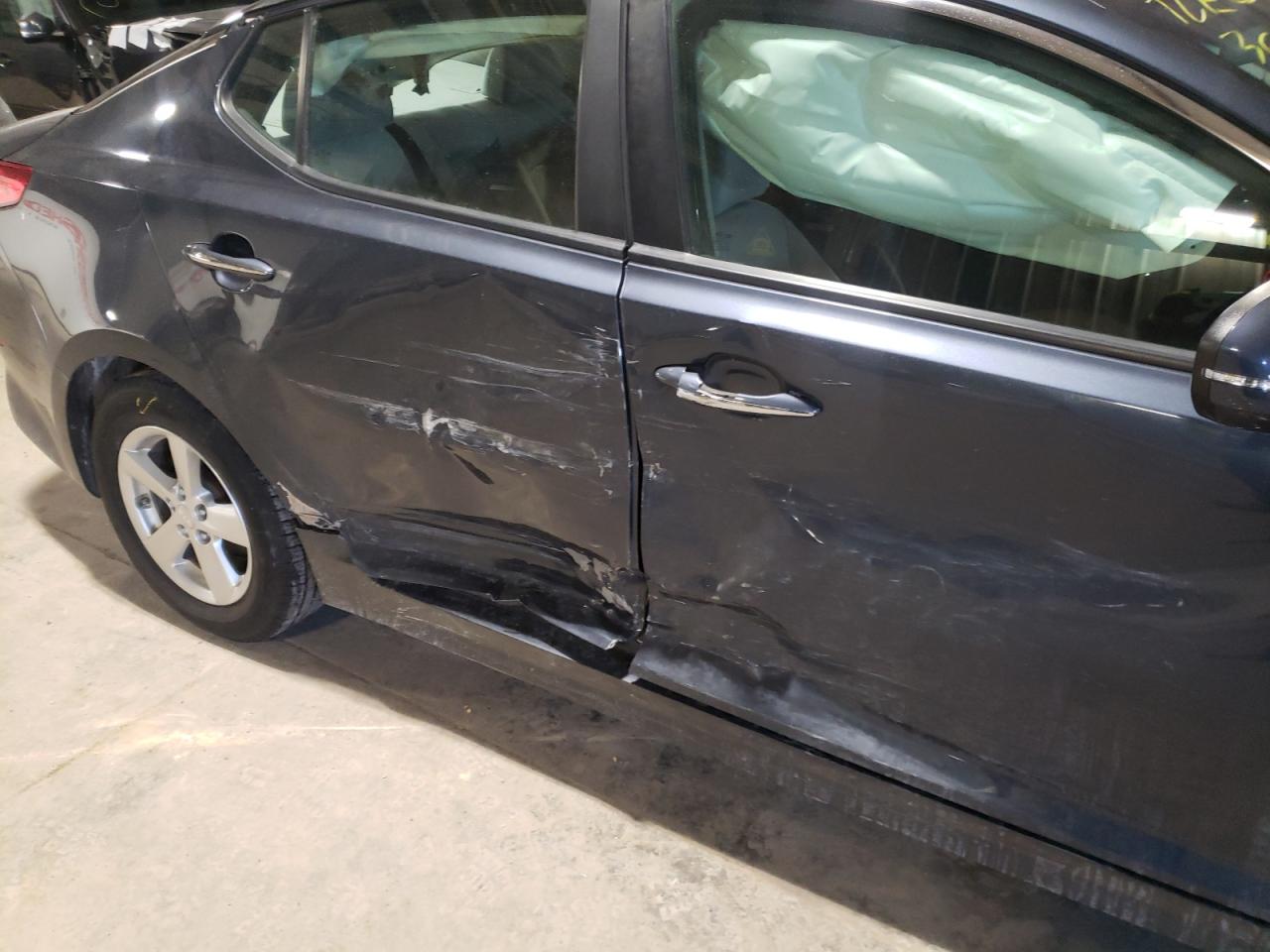 Photo 9 from auction – 2015 KIA OPTIMA LX with VIN KNAGM4A77F5560287